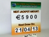 Club lotto sign with interchangeable digits attached with velcro